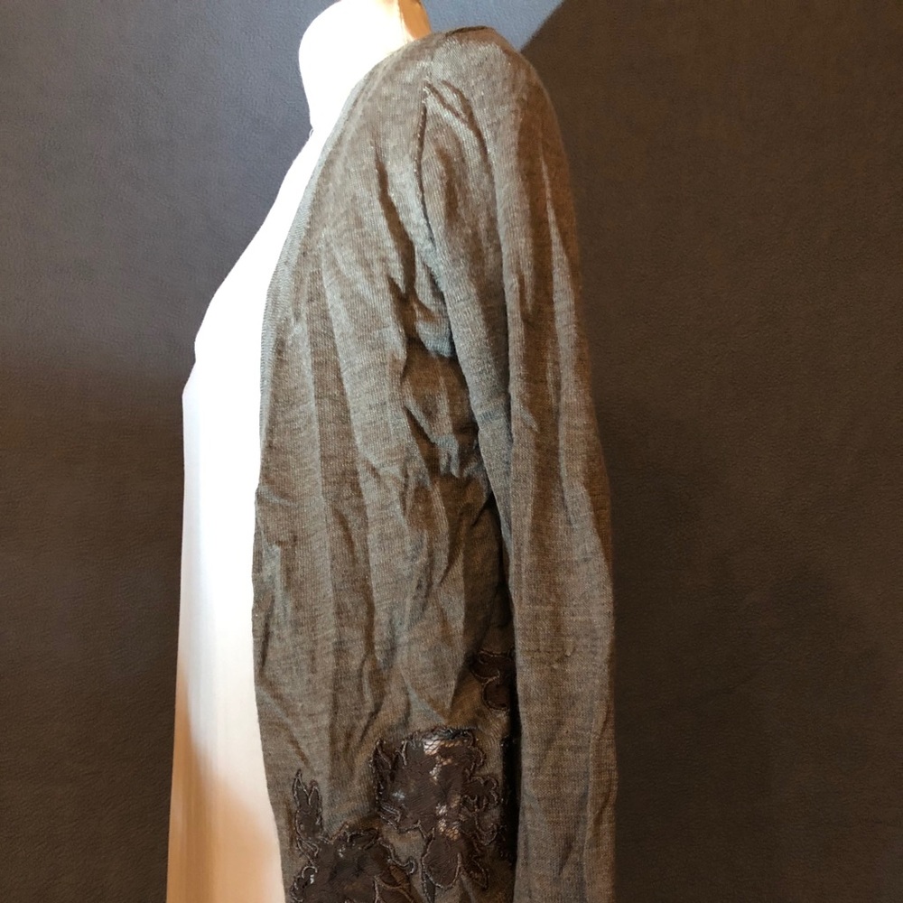 Grey cardigan with flower cut-outs